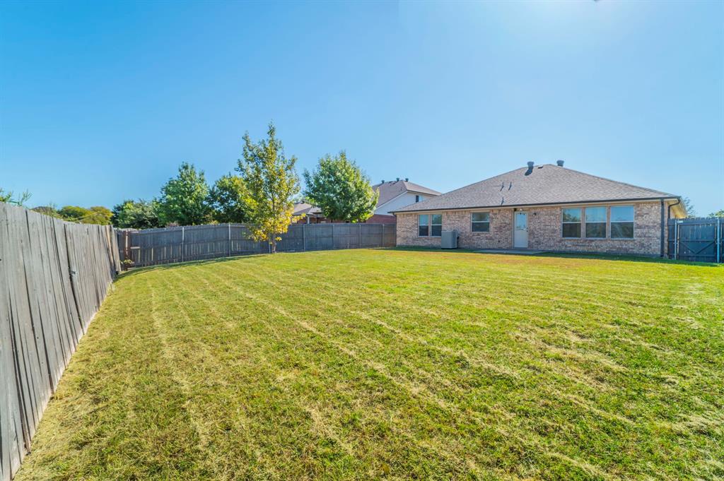 6333 Pool View Drive Dallas, TX 75249 - Photo 32 of 37 a view of a back yard of the house