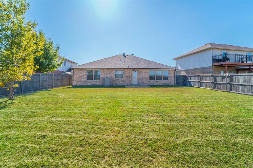 6333 Pool View Drive Dallas, TX 75249 - Photo 33 of 37 a large house with a large pool and large trees