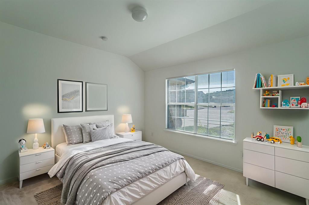 6333 Pool View Drive Dallas, TX 75249 - Photo 7 of 37 a bedroom with bed and a window