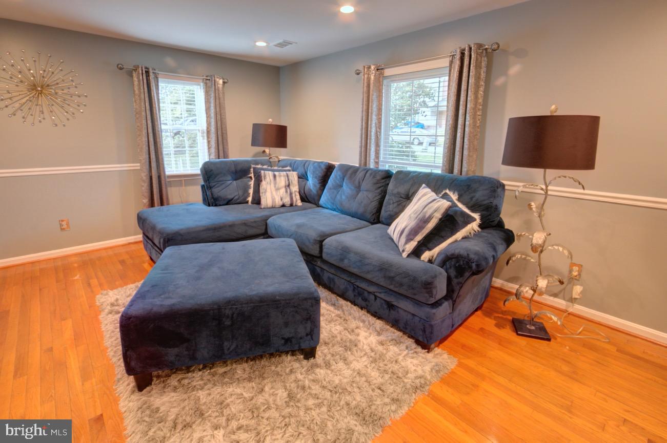 9015 Horton Road Laurel, MD 20708 - Photo 12 of 33 a living room with furniture and a window