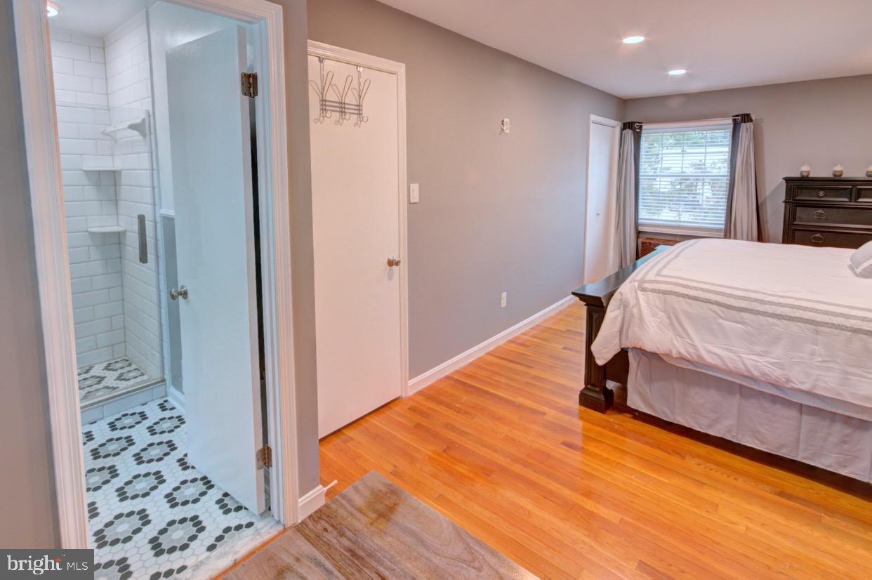 9015 Horton Road Laurel, MD 20708 - Photo 20 of 33 a bedroom with a bed and a window