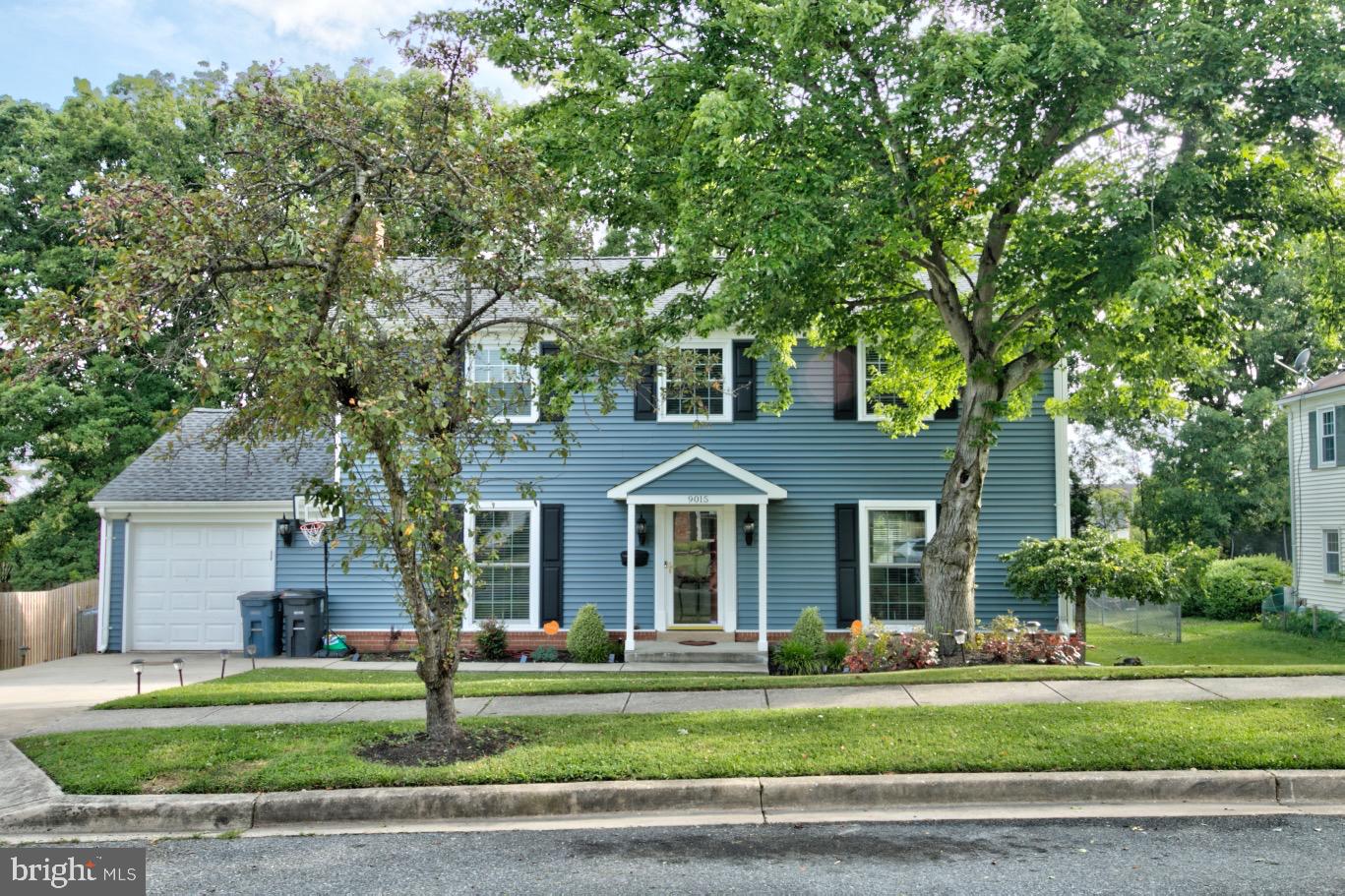 9015 Horton Road Laurel, MD 20708 - Photo 2 of 33 a front view of a house with a garden