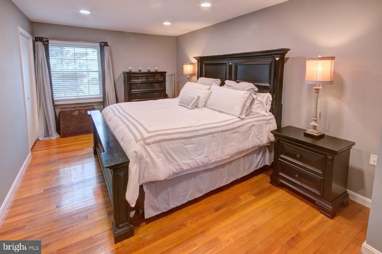 9015 Horton Road Laurel, MD 20708 - Photo 21 of 33 a bedroom with a bed and a television