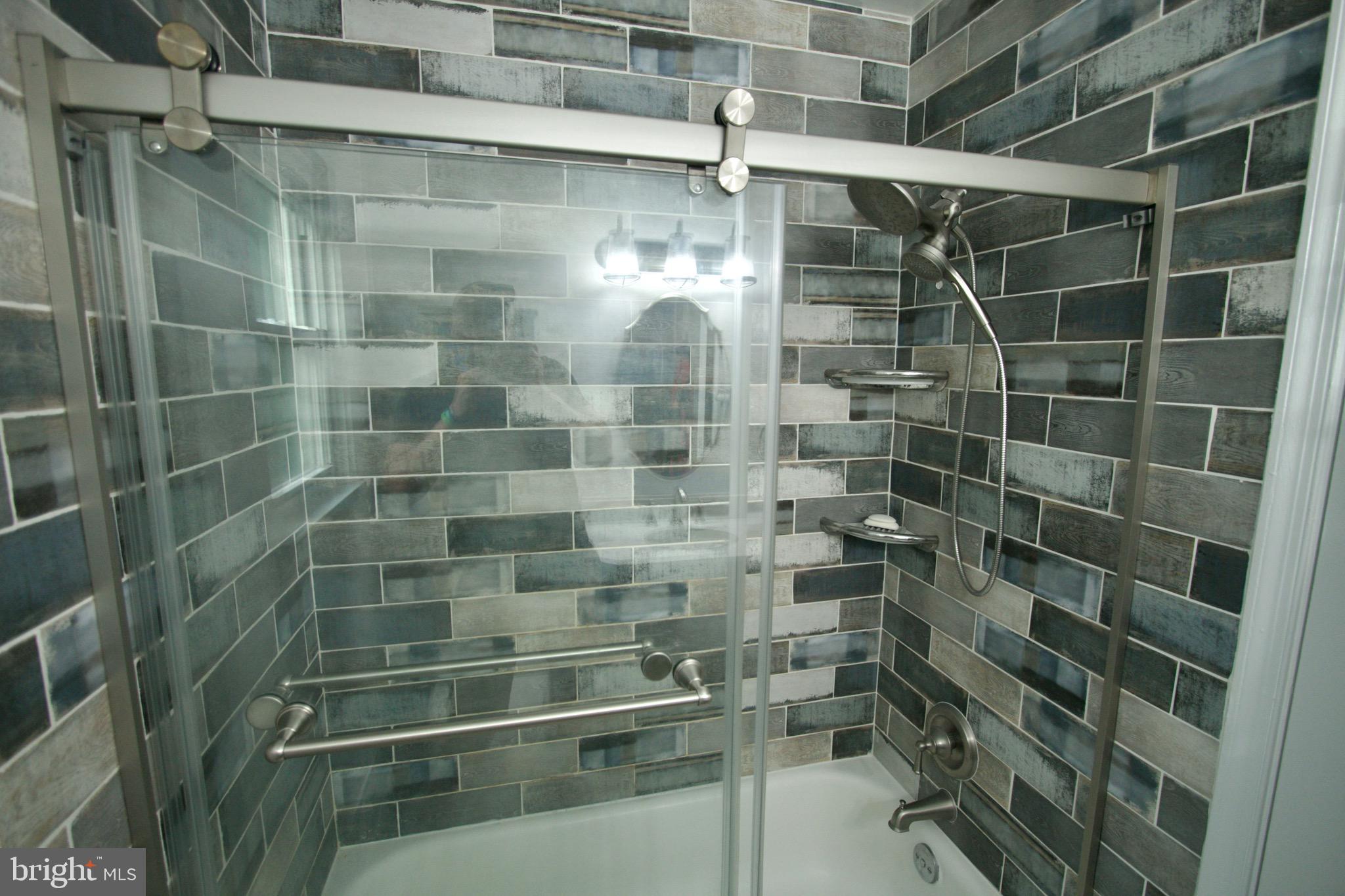 9015 Horton Road Laurel, MD 20708 - Photo 27 of 33 a bathroom with a shower