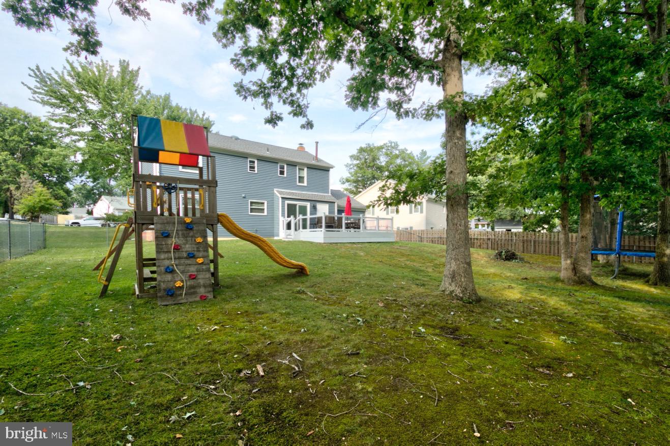 9015 Horton Road Laurel, MD 20708 - Photo 5 of 33 a view of a park with swings and slides