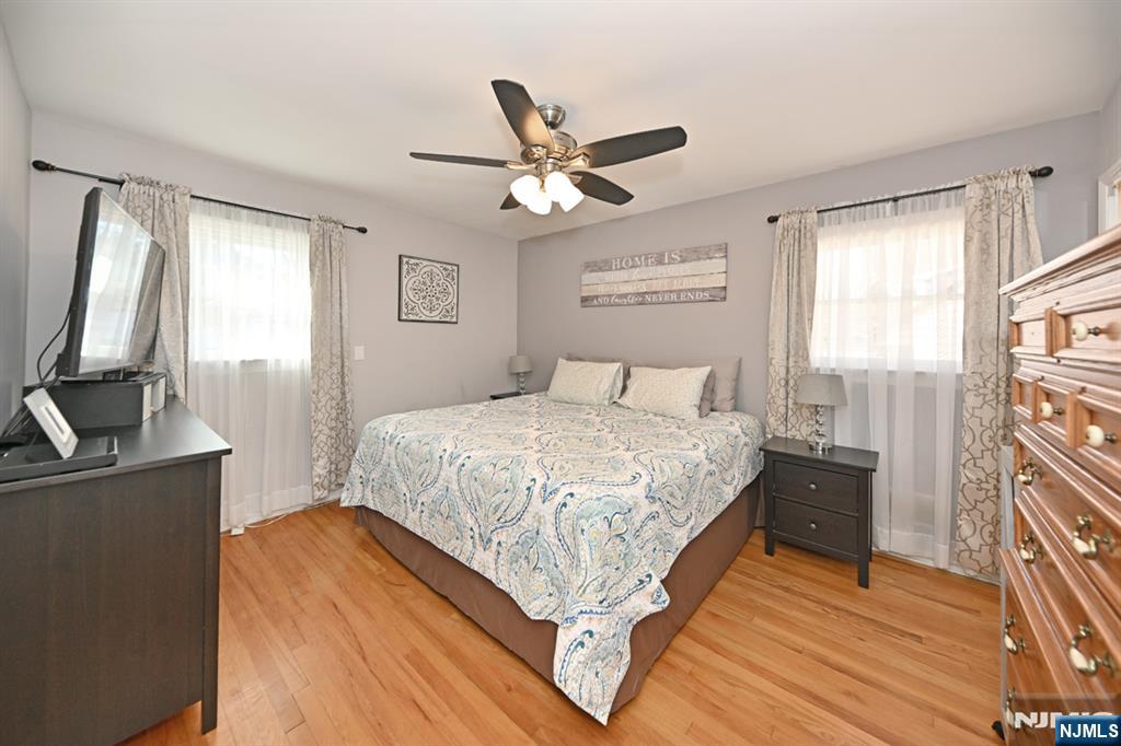 39 Niagara Street Dumont, NJ 07628 - Photo 14 of 40 a bedroom with a bed dresser and a window