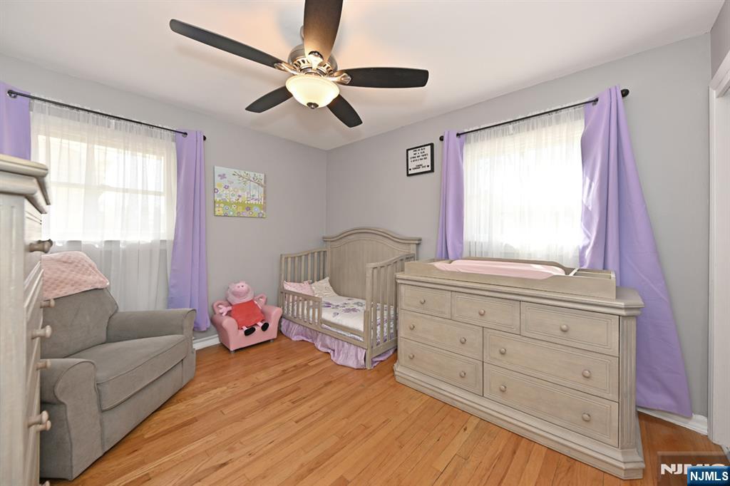39 Niagara Street Dumont, NJ 07628 - Photo 16 of 40 a bedroom with a bed and window