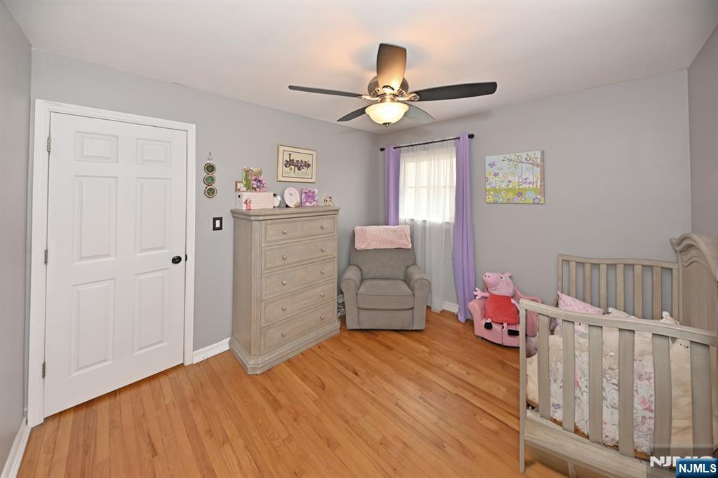 39 Niagara Street Dumont, NJ 07628 - Photo 17 of 40 a bedroom with furniture and a window