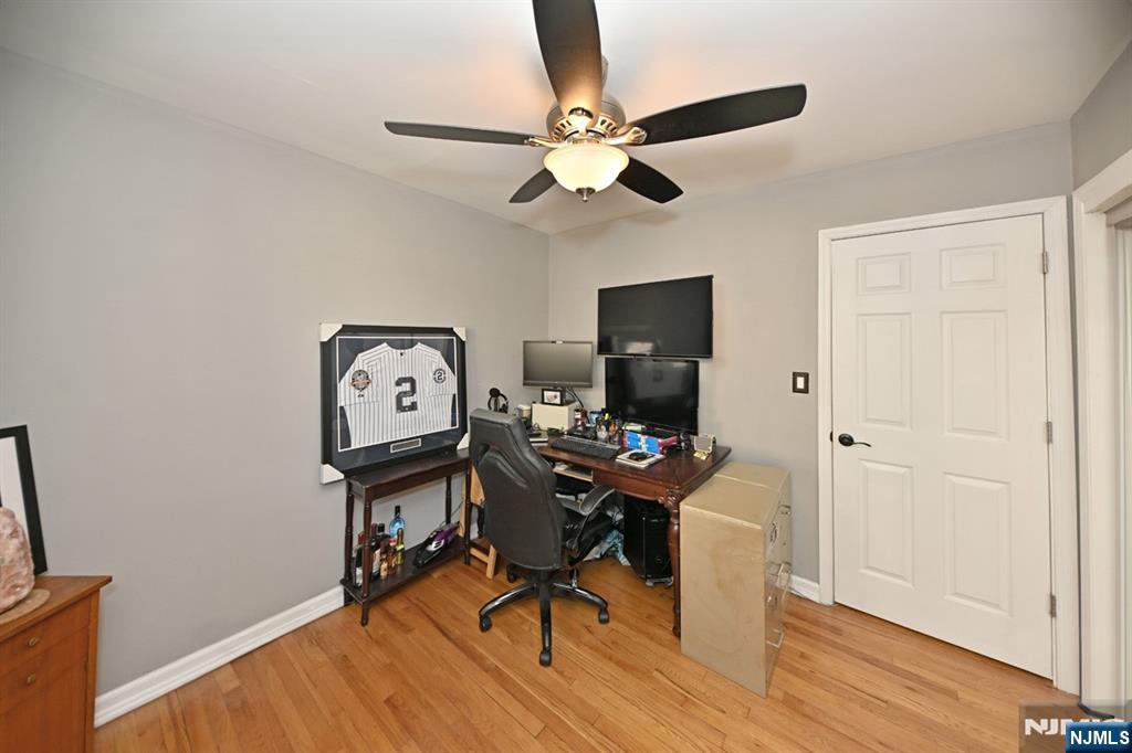 39 Niagara Street Dumont, NJ 07628 - Photo 19 of 40 a view of a workspace with furniture and wooden floor