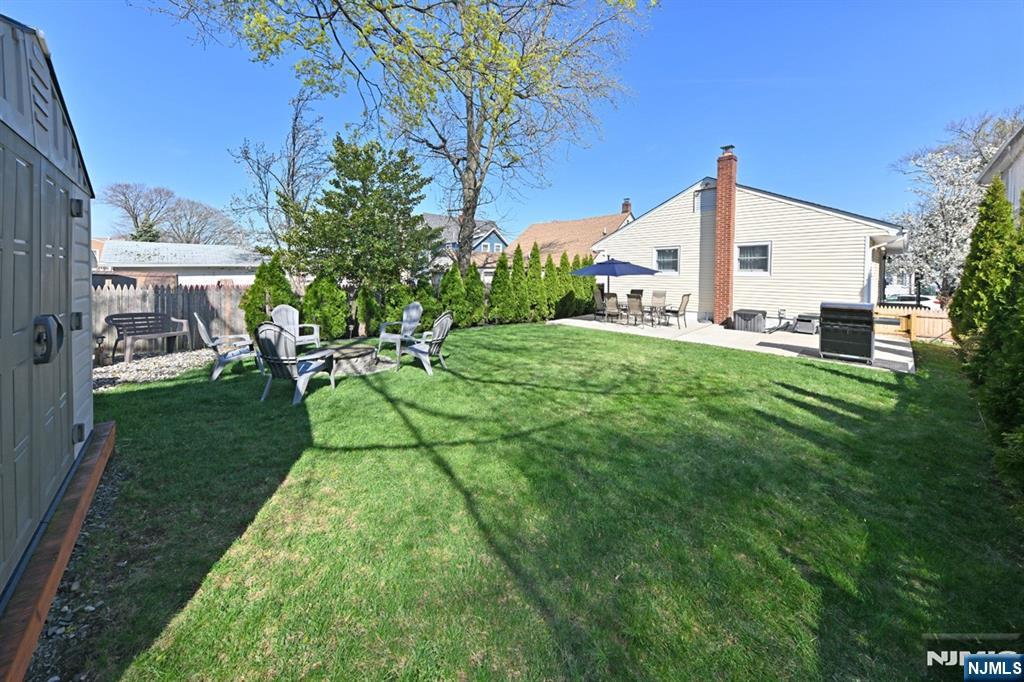 39 Niagara Street Dumont, NJ 07628 - Photo 21 of 40 a view of a backyard with sitting area