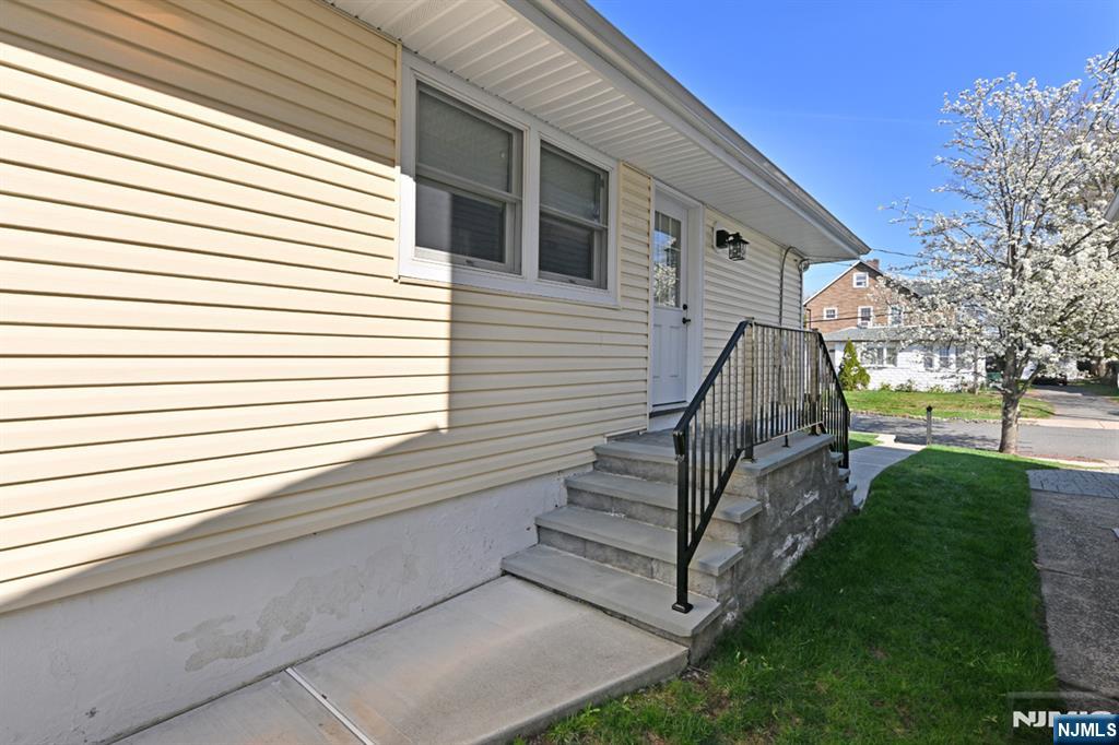 39 Niagara Street Dumont, NJ 07628 - Photo 26 of 40 a view of a house with a yard