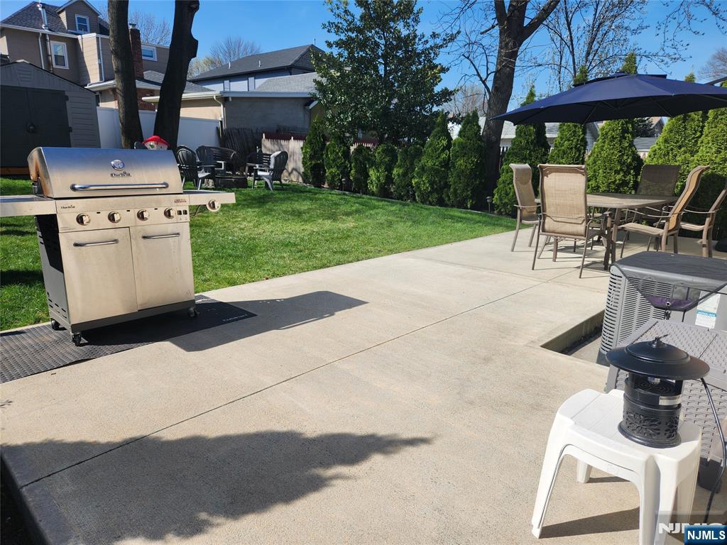 39 Niagara Street Dumont, NJ 07628 - Photo 27 of 40 a view of backyard with outdoor seating