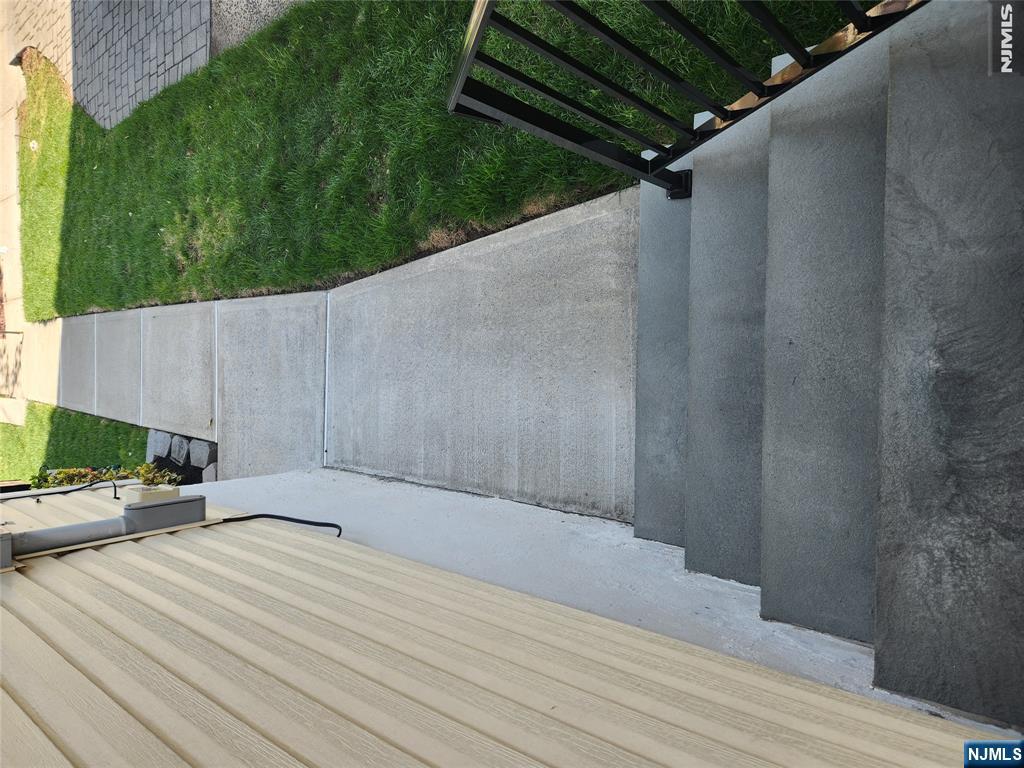 39 Niagara Street Dumont, NJ 07628 - Photo 33 of 40 a view of backyard with seating area
