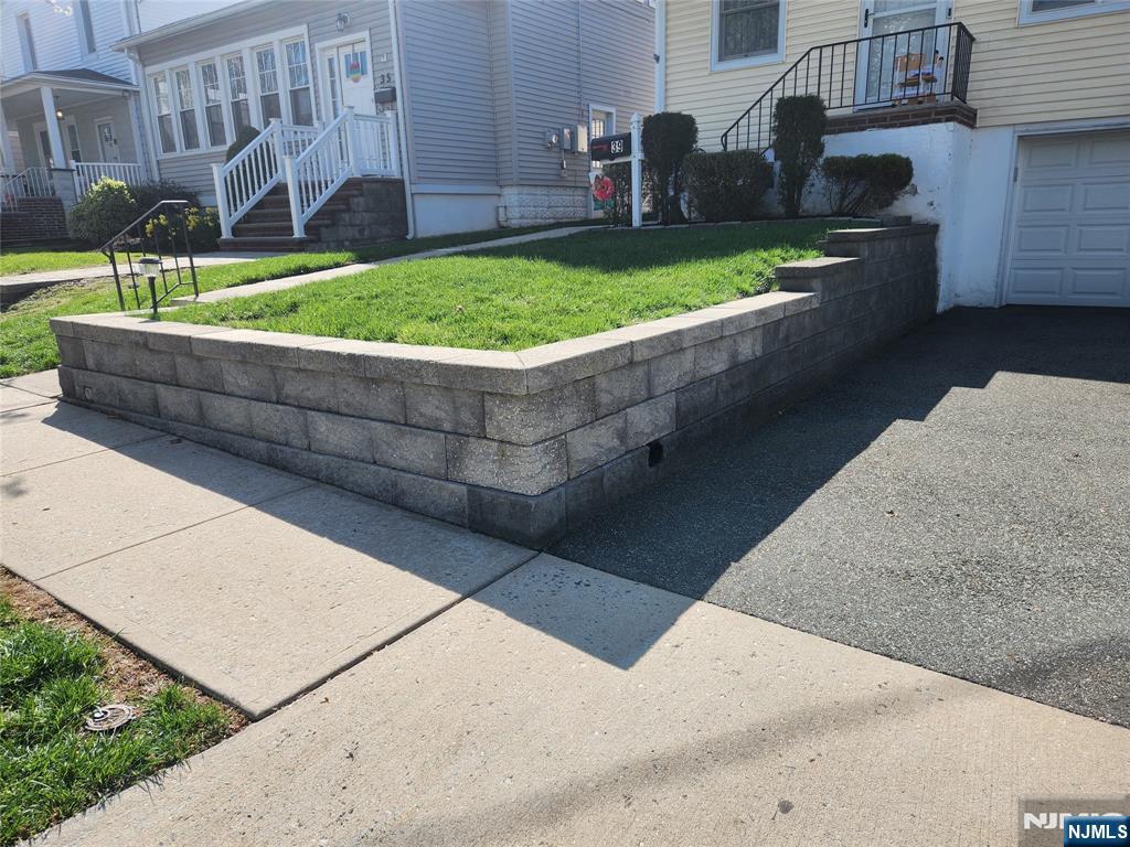 39 Niagara Street Dumont, NJ 07628 - Photo 35 of 40 a view of a garden with an outdoor seating
