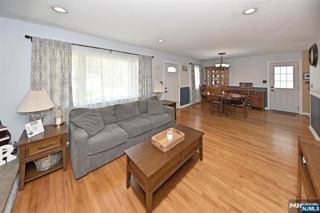 39 Niagara Street Dumont, NJ 07628 - Photo 7 of 40 a living room with furniture and a large window
