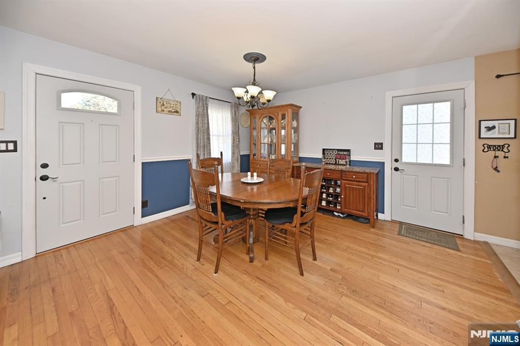 39 Niagara Street Dumont, NJ 07628 - Photo 9 of 40 a view of a dining room with furniture window and wooden floor