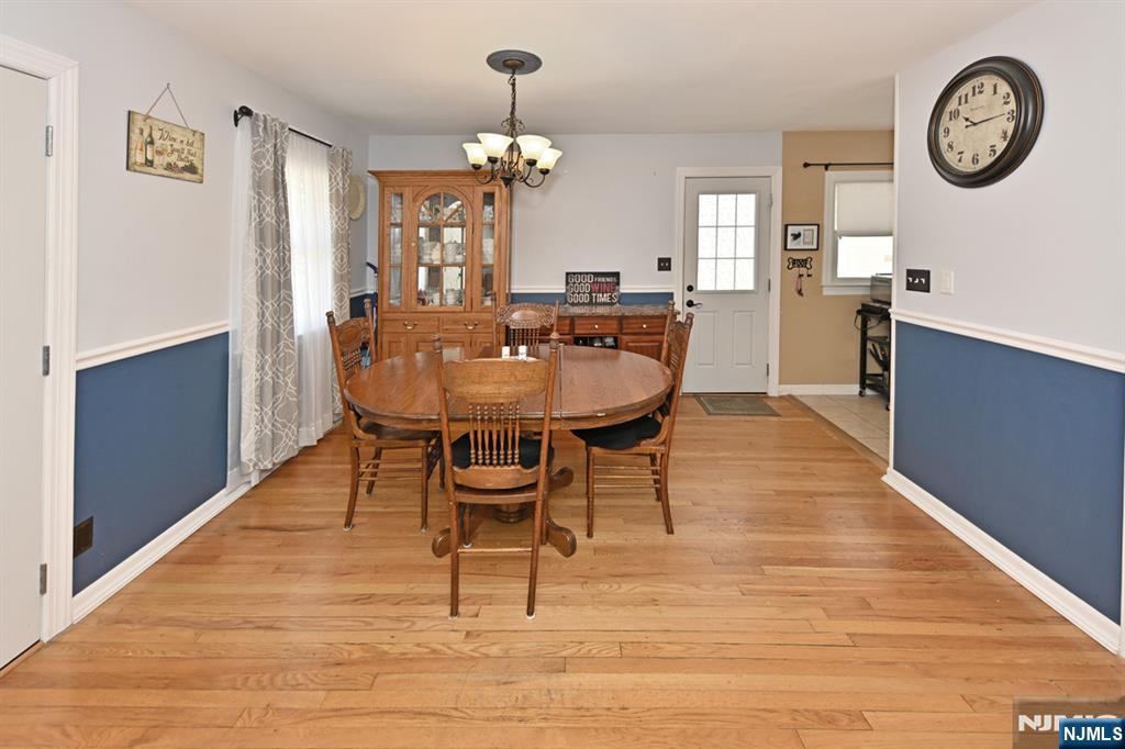 39 Niagara Street Dumont, NJ 07628 - Photo 10 of 40 a view of a dining room with furniture and wooden floor