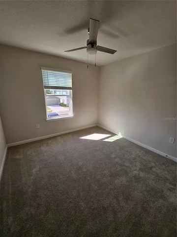 an empty room with a bathroom
