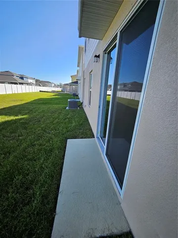 a house view with a outdoor space