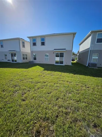 a view of swimming pool with outdoor space and seating area