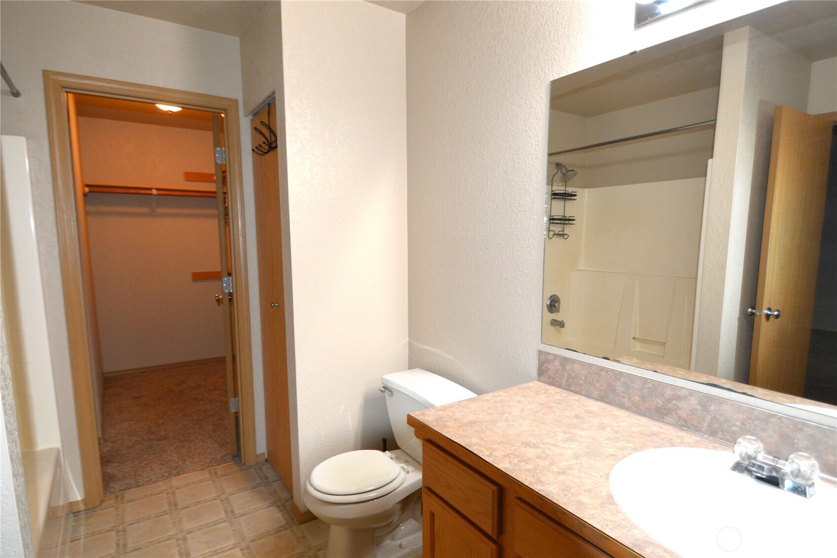 3419 Bittersweet Street Southeast Olympia, WA 98501 - Photo 12 of 15 a bathroom with a sink a toilet and shower