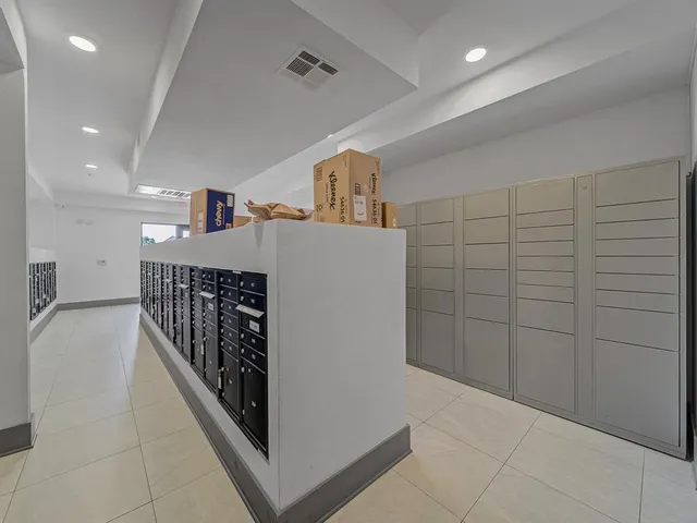 a bathroom with a glass door shower