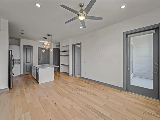 a view of a kitchen with a sink and a kitchen
