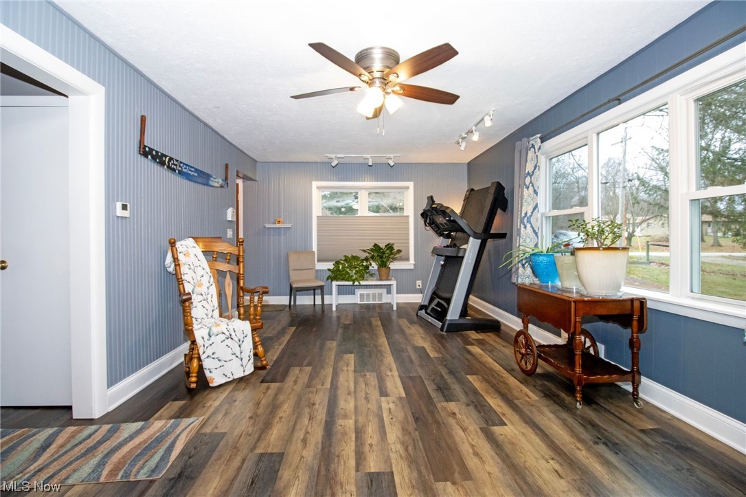 4464 Buss Road Wooster, OH 44691 - Photo 12 of 20 Living area featuring dark wood-type flooring, ceiling fan, and track lighting