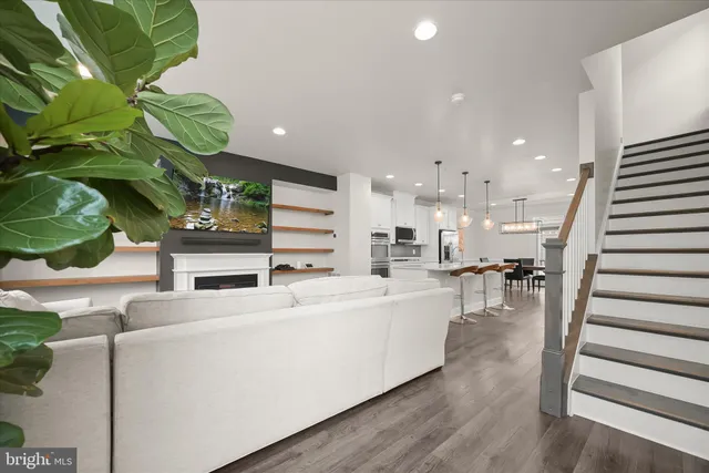 a view of a balcony with wooden floor