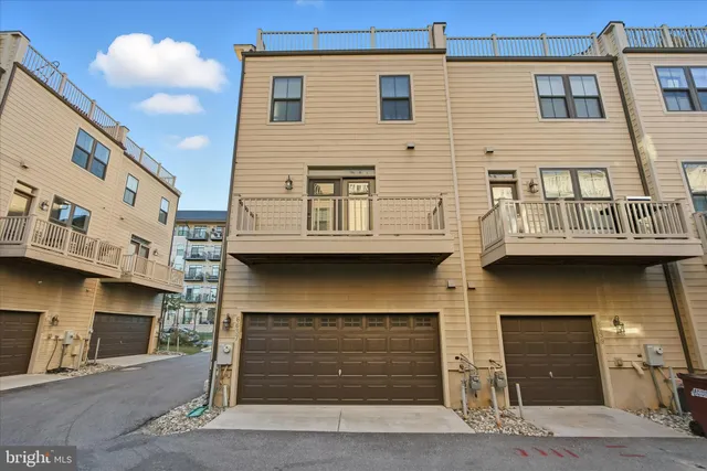 a view of a balcony with wooden floor