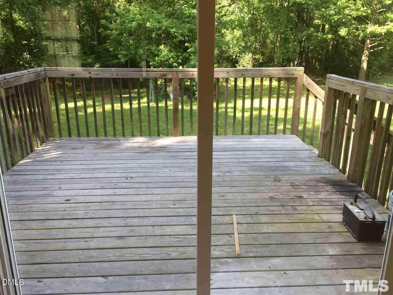 725 Perry Howard Road Fuquay-Varina, NC 27526 - Photo 8 of 16 a view of outdoor space with deck