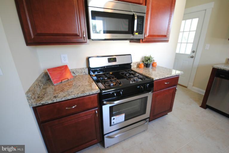 3218 Grace Road Baltimore, MD 21219 - Photo 3 of 30 Chef's Kitchen with Granite Counter Tops