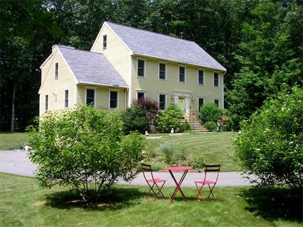 20 Fox Run Groton, MA 01450 - Photo 1 of 1 a view of a house with a yard and sitting area