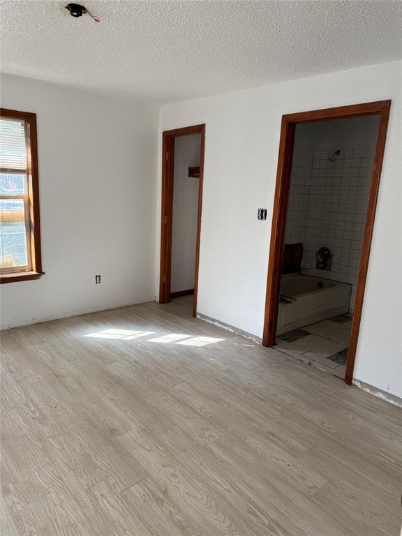 1814 South Neches Street, Unit 1816 Coleman, TX 76834 - Photo 13 of 18 textured ceiling