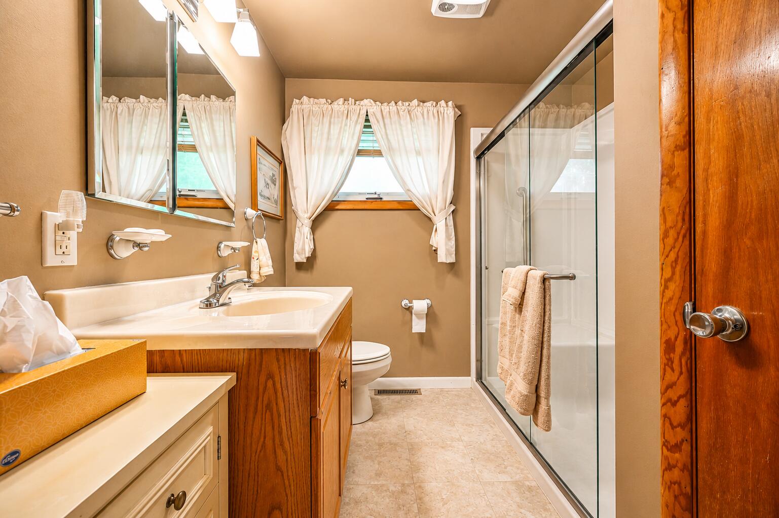 4735 West Ridgewood Road Springfield, OH 45503 - Photo 16 of 30 Updated bathroom; including walk in shower with doors.