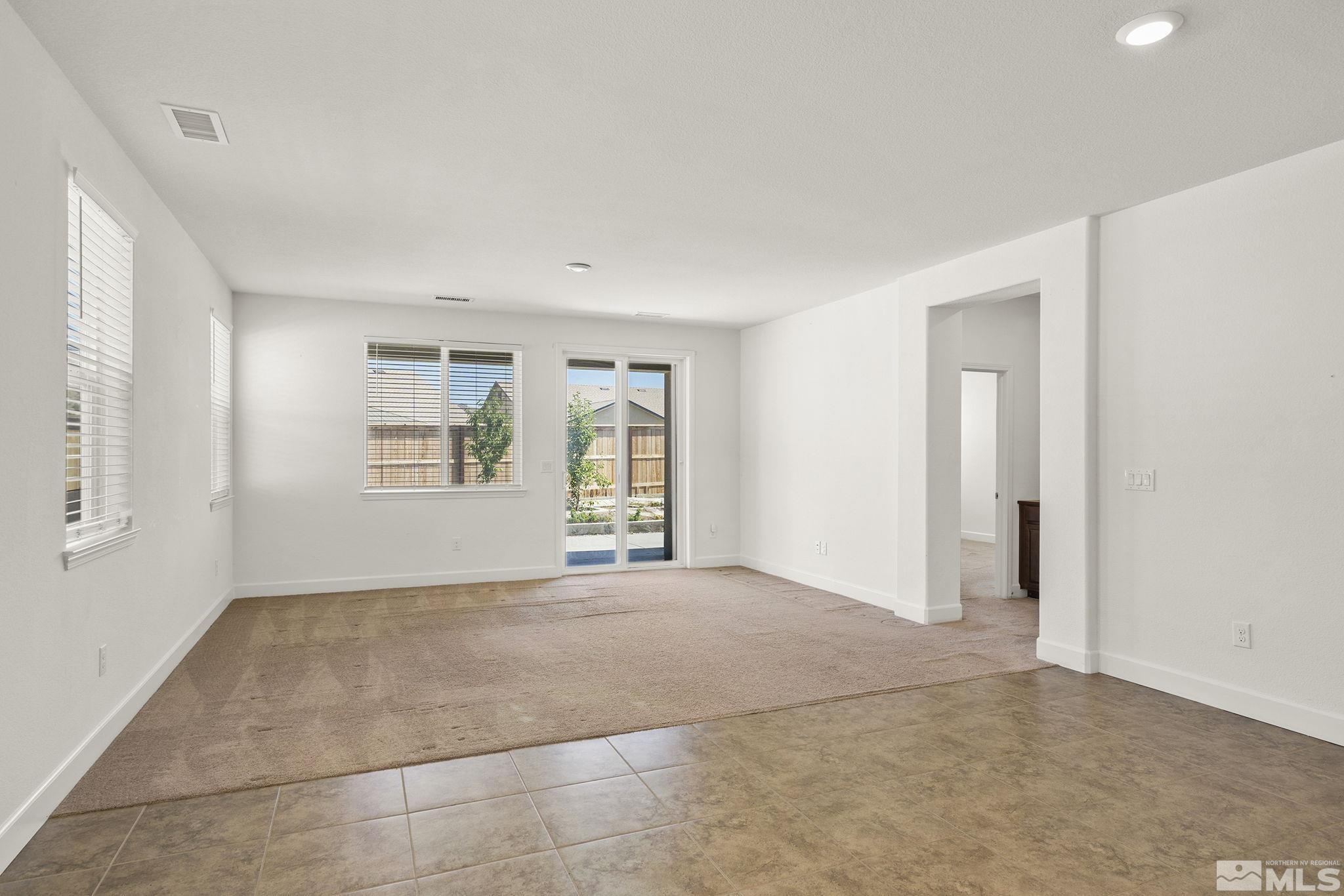 7360 Continuum Drive Reno, NV 89506 - Photo 12 of 28 an empty room with windows and closet
