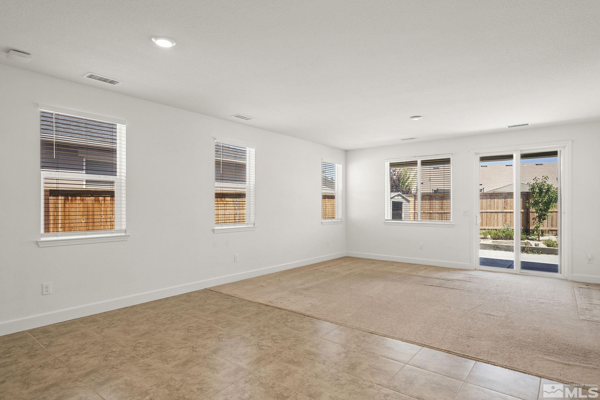 7360 Continuum Drive Reno, NV 89506 - Photo 13 of 28 a view of an empty room with a window