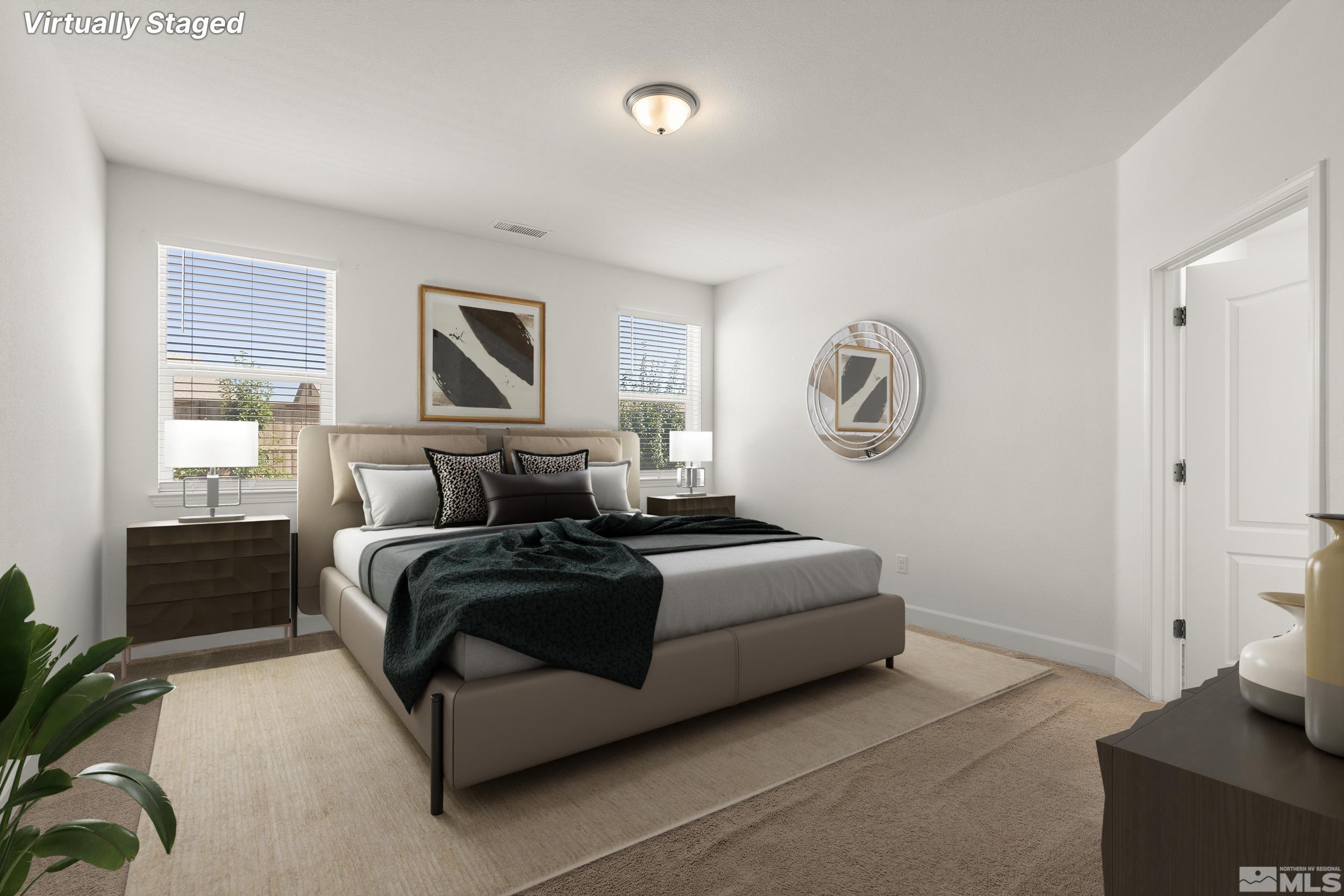 7360 Continuum Drive Reno, NV 89506 - Photo 15 of 28 a bedroom with bed and a window