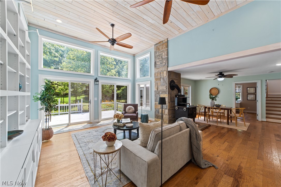 45455 Parsons Road Oberlin, OH 44074 - Photo 3 of 50 Great room with floor to ceiling windows with sliders opening to the deck overlooking the lush backyard