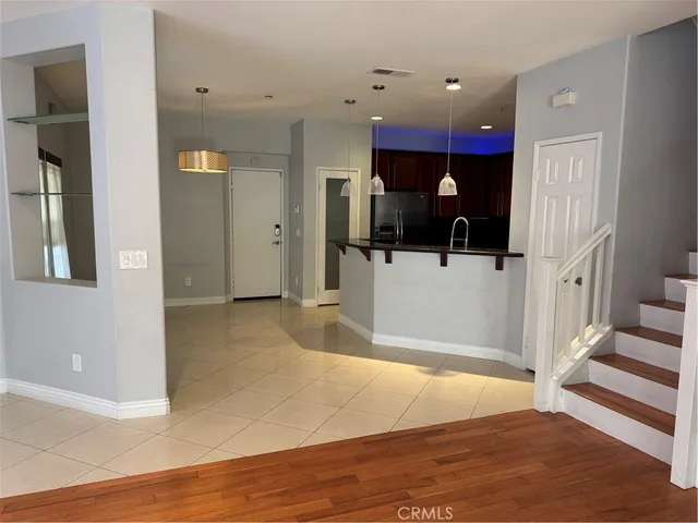 a view of a living room with a flat screen tv