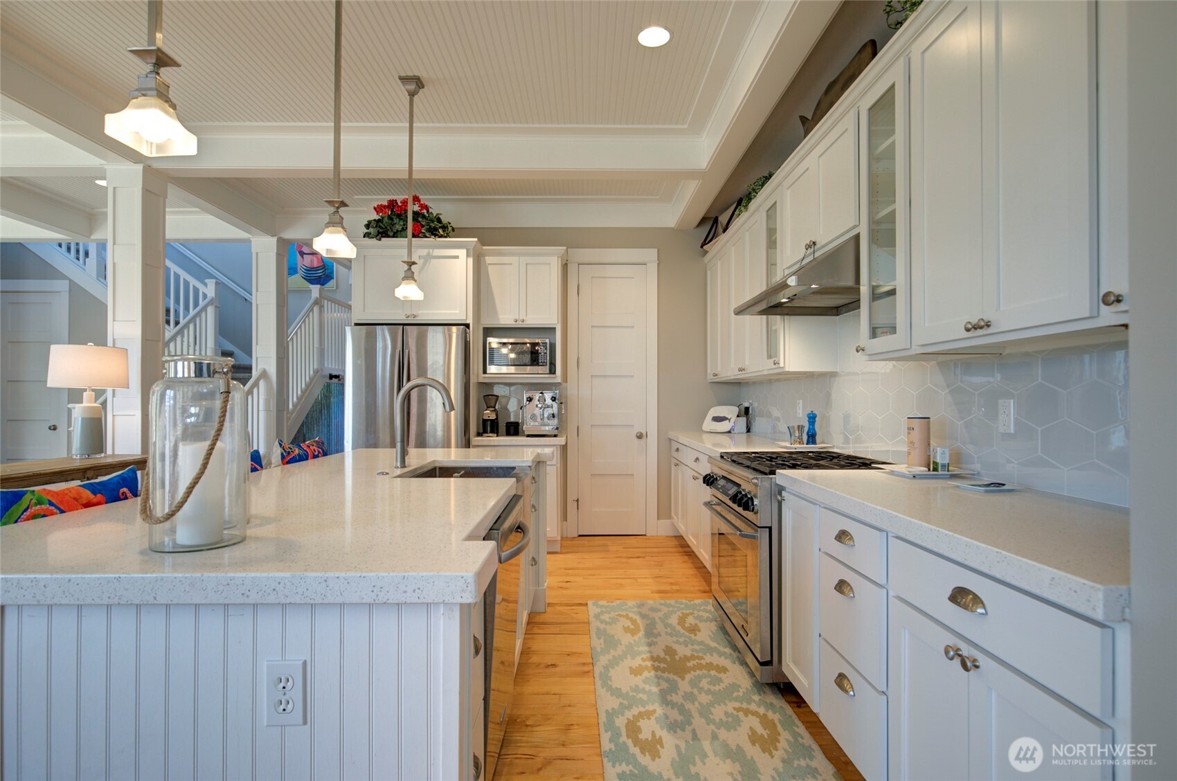 33 Fireside Lane Pacific Beach, WA 98571 - Photo 12 of 40 a kitchen with stainless steel appliances granite countertop a sink stove and refrigerator