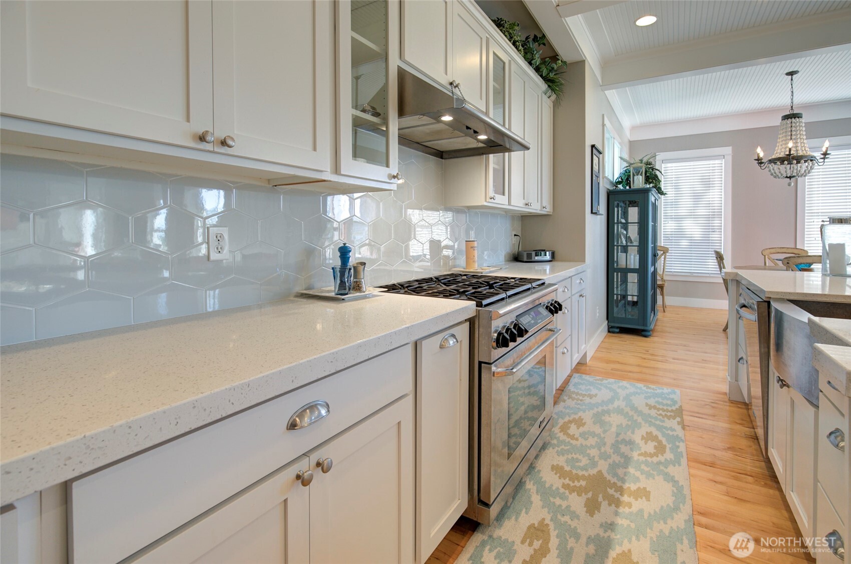 33 Fireside Lane Pacific Beach, WA 98571 - Photo 14 of 40 a kitchen with stainless steel appliances granite countertop a stove and a sink