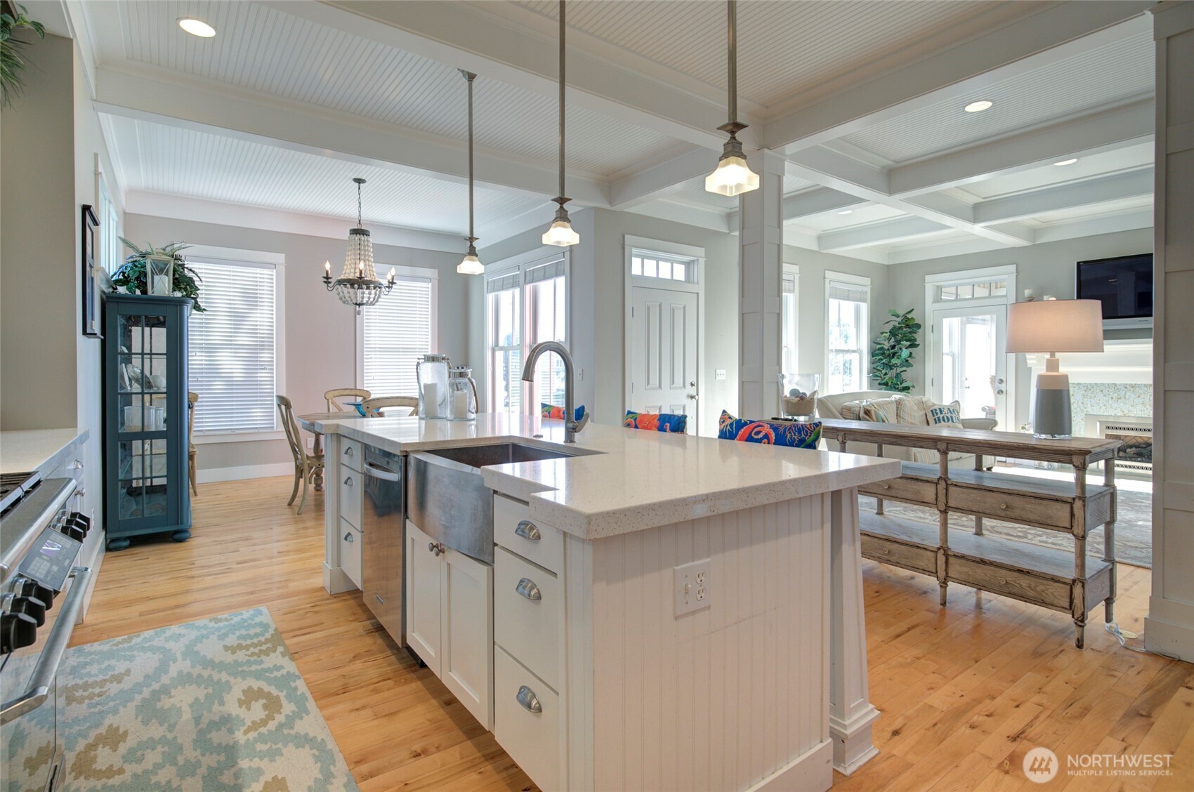 33 Fireside Lane Pacific Beach, WA 98571 - Photo 15 of 40 a kitchen with counter top space and a dining table