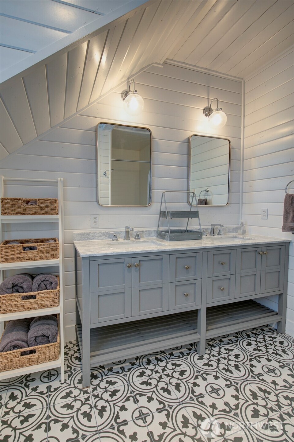 33 Fireside Lane Pacific Beach, WA 98571 - Photo 31 of 40 a bathroom with a double vanity sink and a mirror