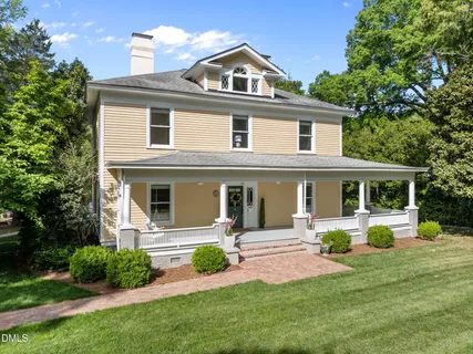 a view of a house with a big yard