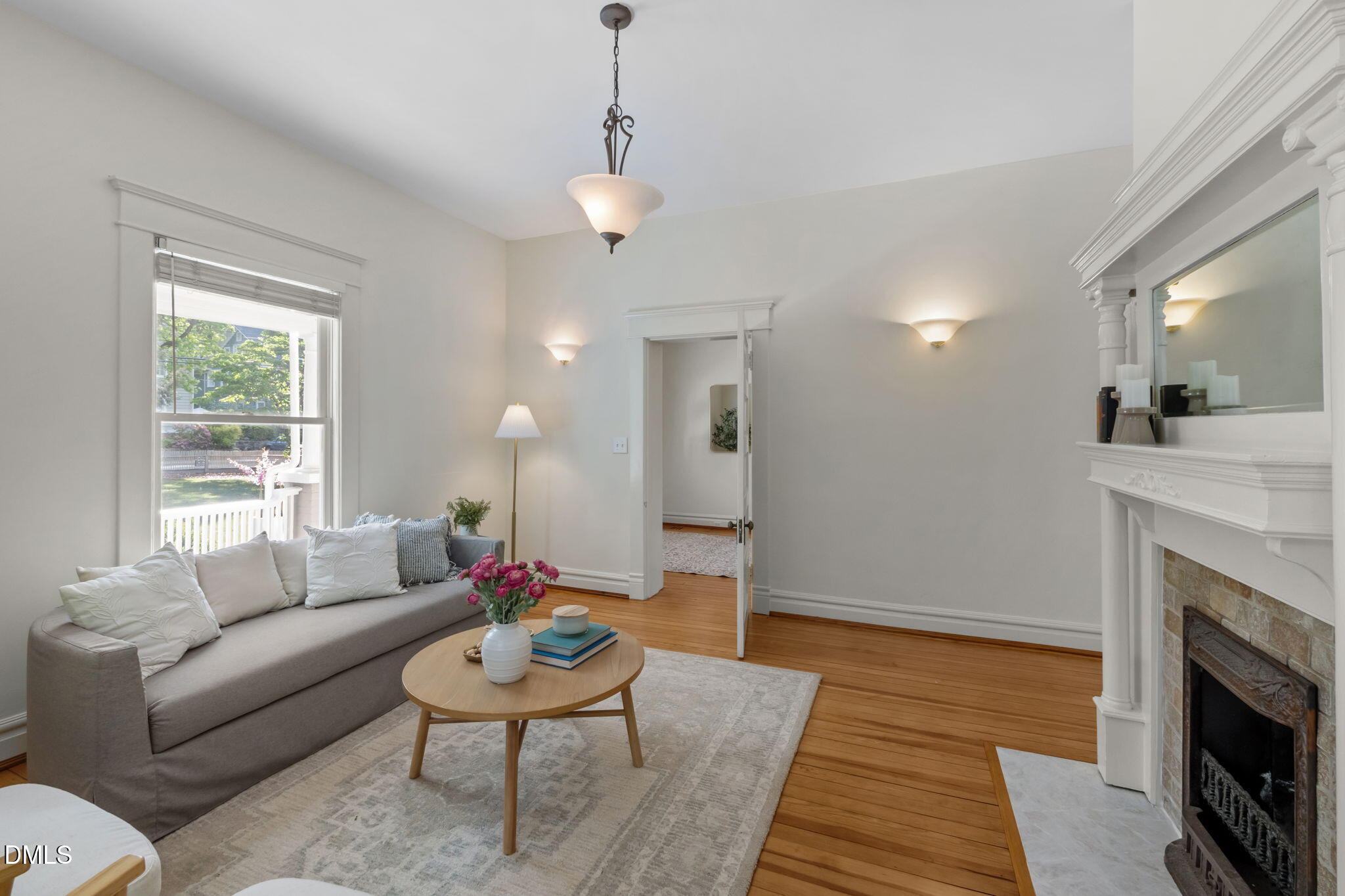 400 Ransom Street Chapel Hill, NC 27516 - Photo 18 of 67 a living room with furniture a fireplace and a table