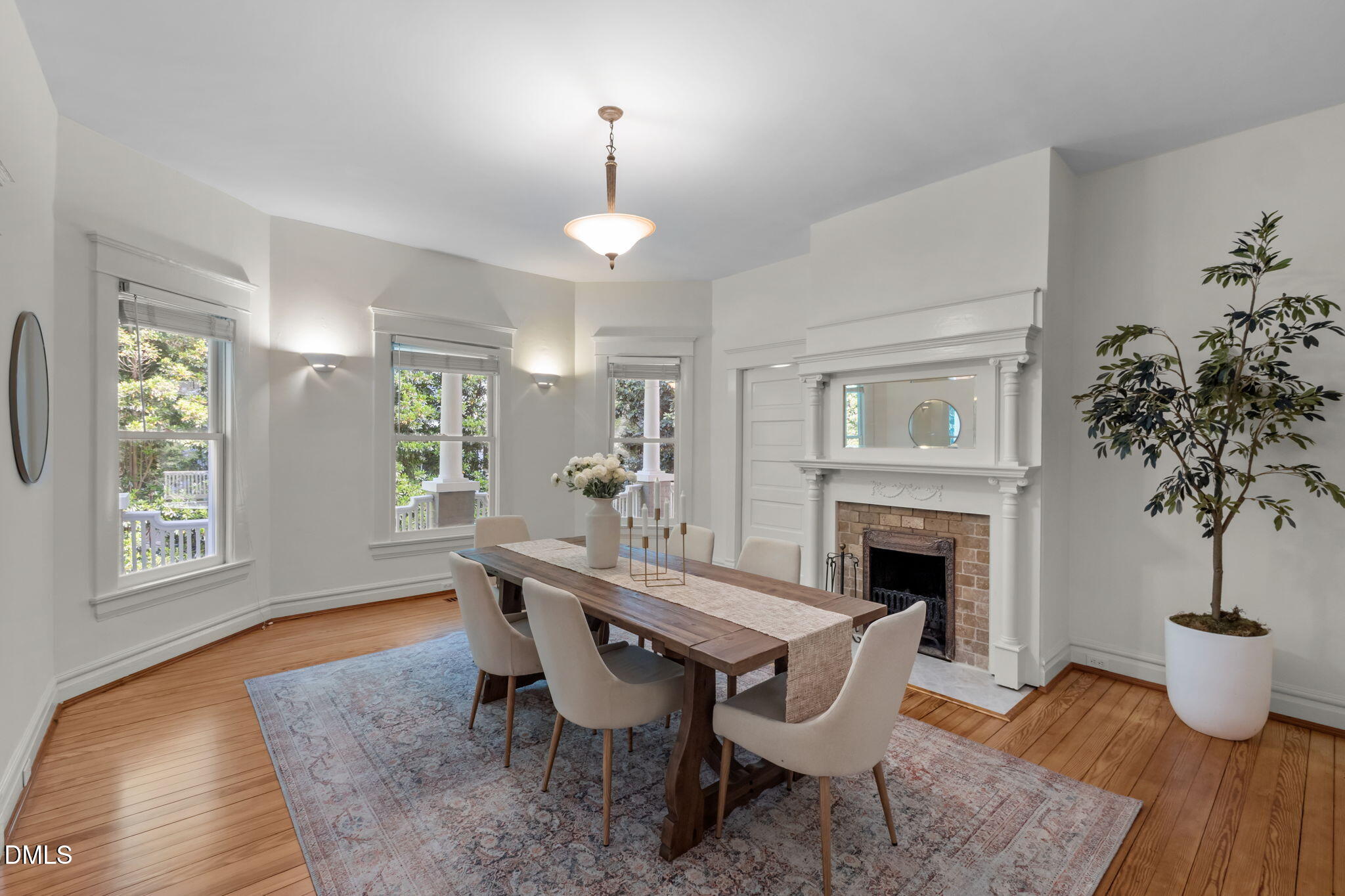 400 Ransom Street Chapel Hill, NC 27516 - Photo 21 of 67 a view of a dining room with furniture window and wooden floor