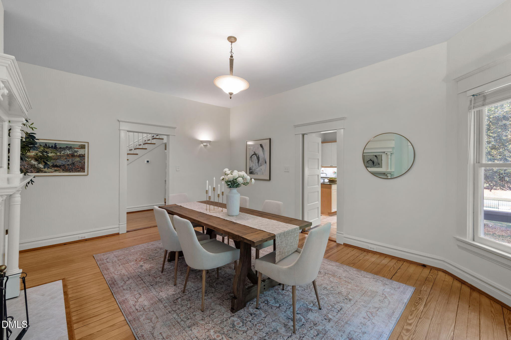 400 Ransom Street Chapel Hill, NC 27516 - Photo 22 of 67 a view of a dining room with furniture and wooden floor