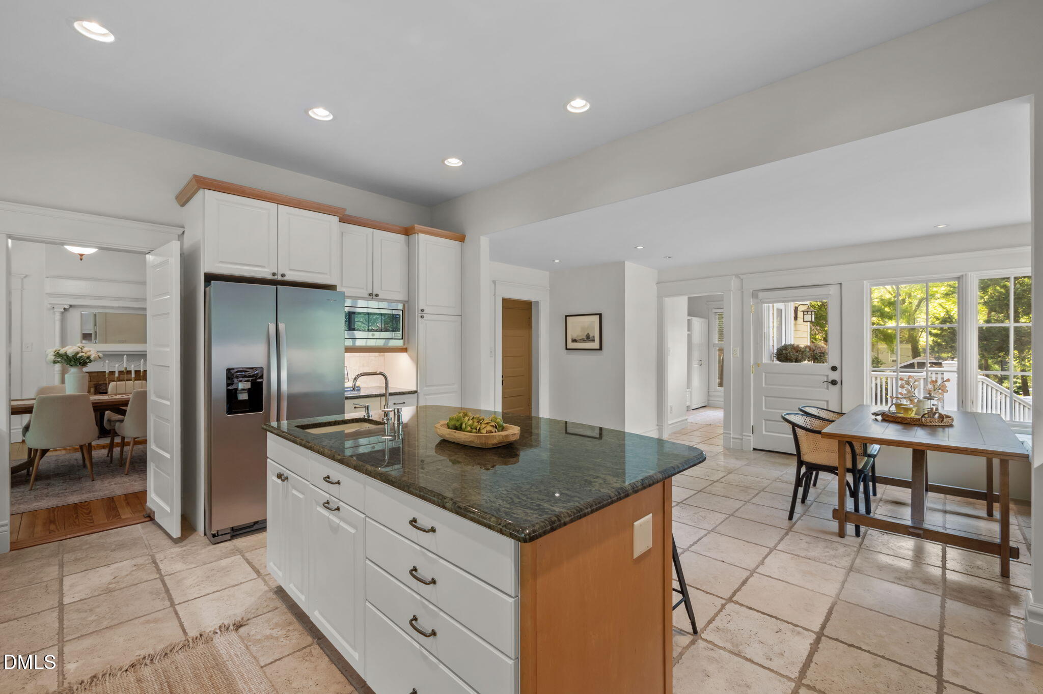 400 Ransom Street Chapel Hill, NC 27516 - Photo 30 of 67 a kitchen with granite countertop a sink and cabinets
