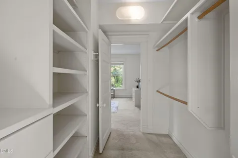 a bath room with a toilet a sink and a bath tub